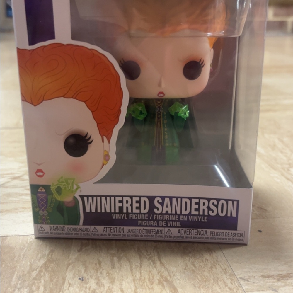 Funko Pop Vinyl Figure with Orange Hair and Green Outfit